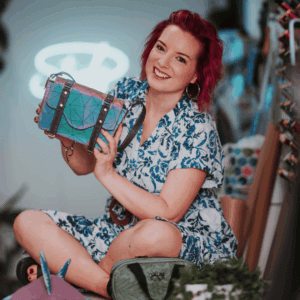 emma of studio 7t7 is the designer and bag making teacher. sat on a table with the jeanie bag pattern.